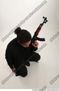 09 2018 01 GARSON FURY ACTION SITTING POSE WITH GUN